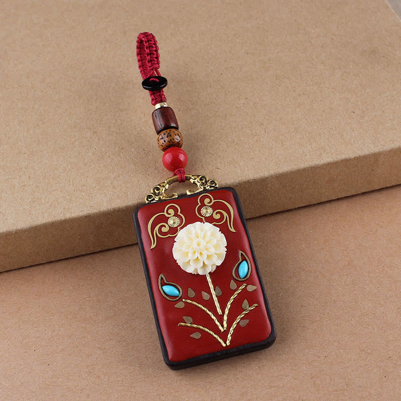 Hand-Carved Ebony Wood Red String Keyring with Symbolic Motifs