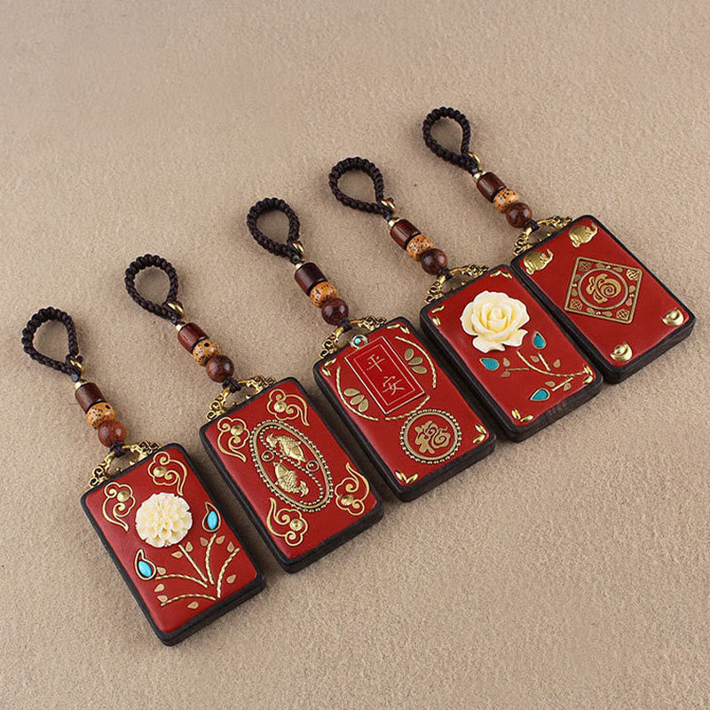 Hand-Carved Ebony Wood Red String Keyring with Symbolic Motifs