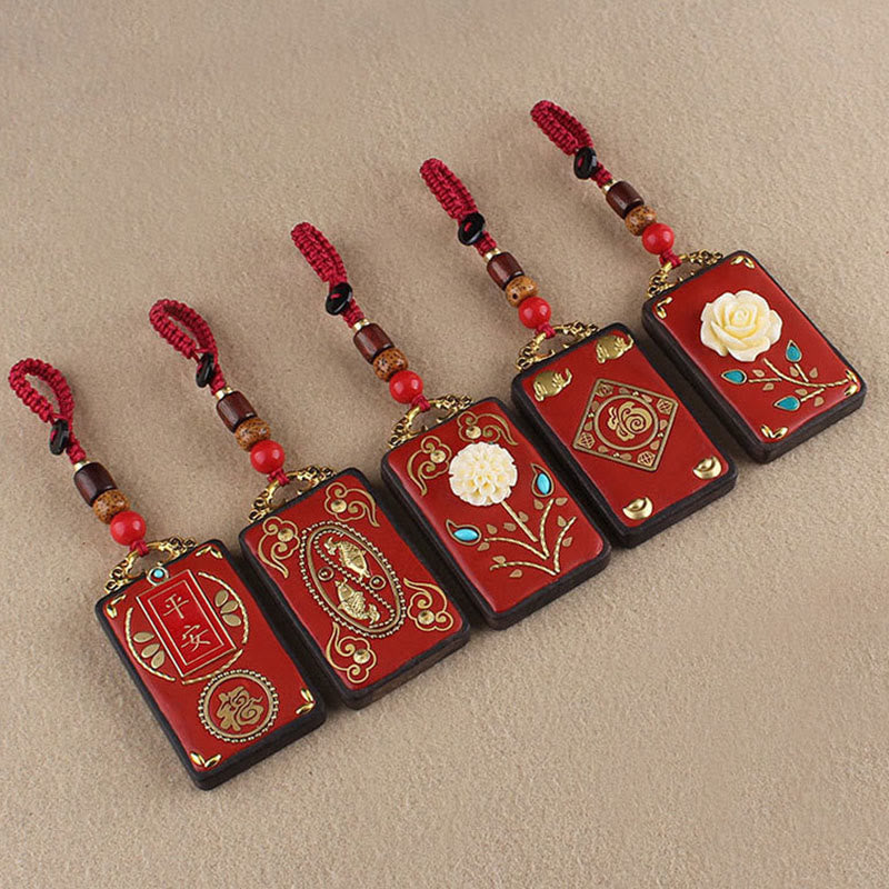 Hand-Carved Ebony Wood Red String Keyring with Symbolic Motifs