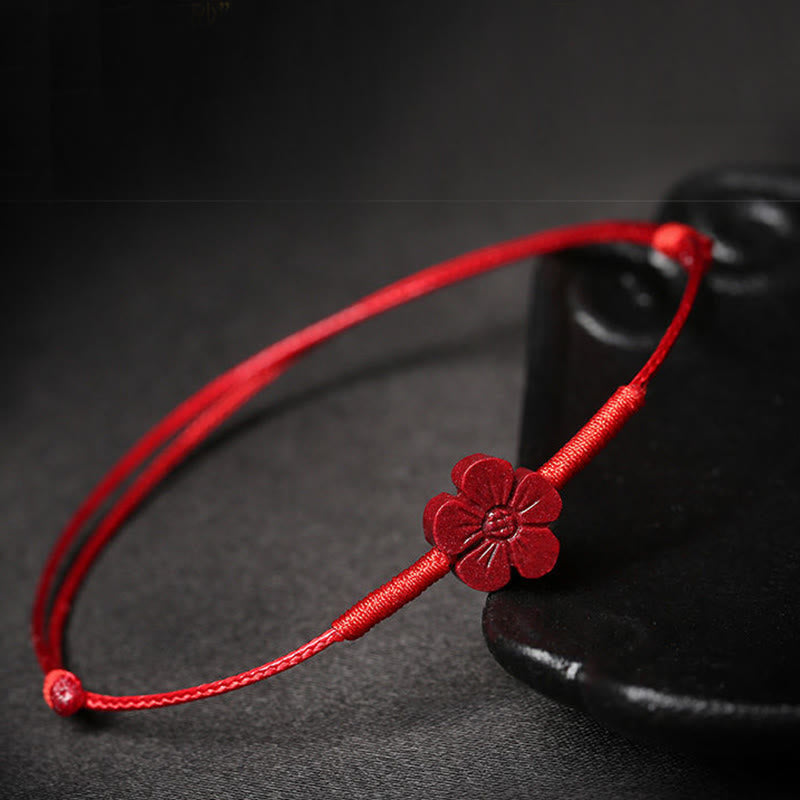 Handmade Cinnabar Braided Red String Bracelet with Carved Symbolic Charms