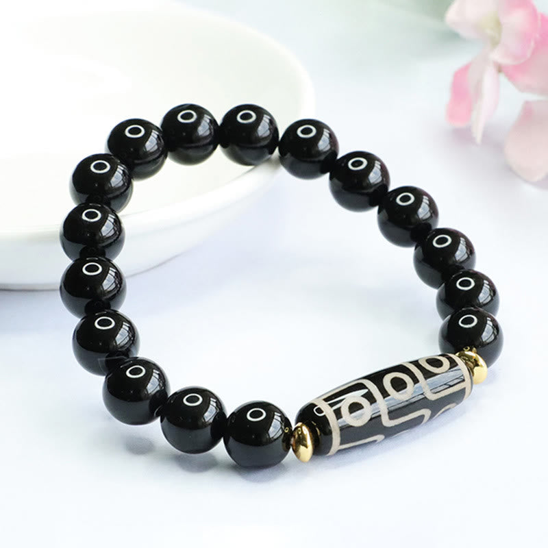 Tibetan Nine-Eye Dzi Bead and Black Onyx Grounding Beaded Bracelet