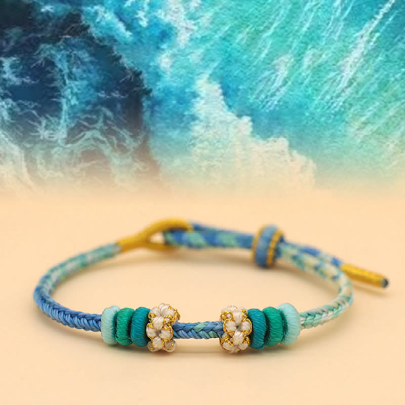Handmade Eight-Thread Braided Endless Knot Bracelet with Peach Blossom Detail