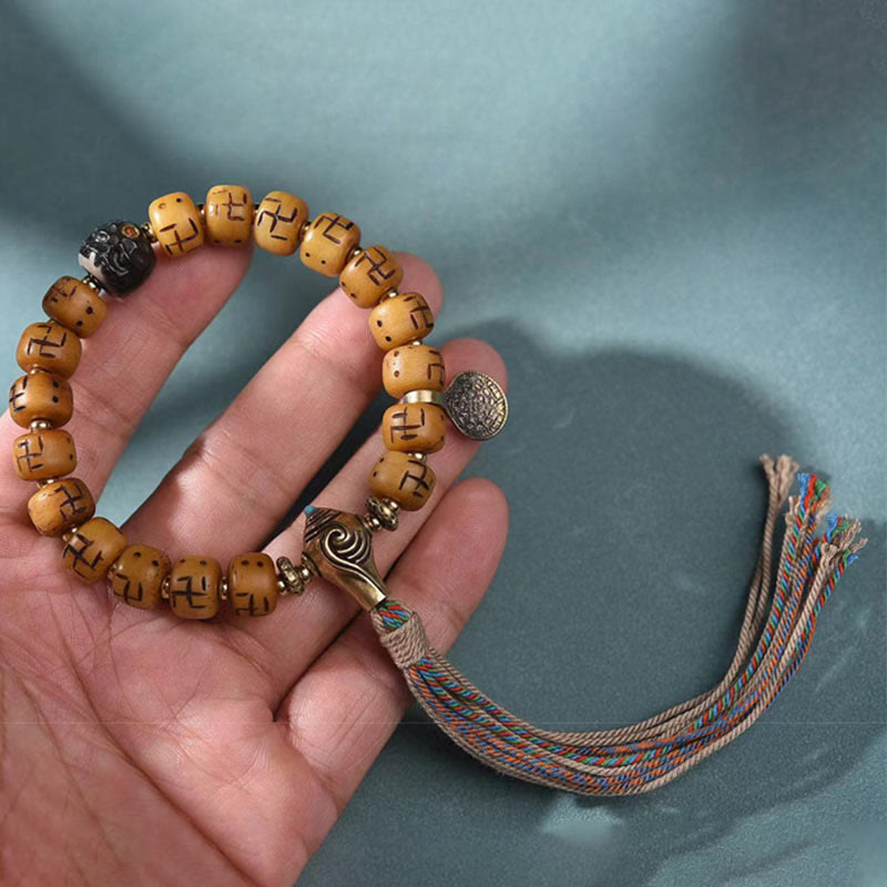 Natural Tibetan Camel Bone Bracelet with Dzi Bead, Shankha, or Kirtimukha Charms