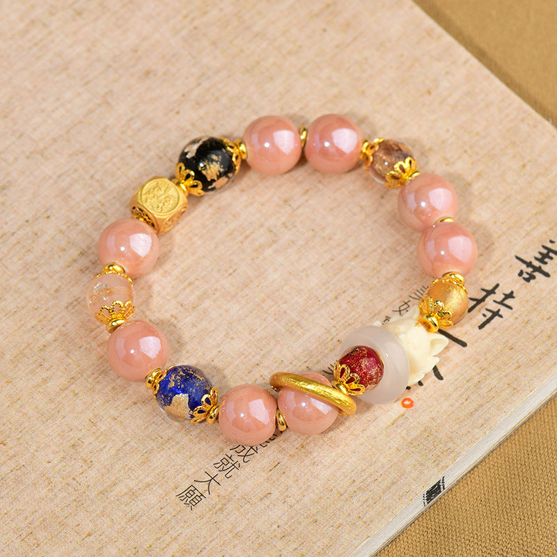 Artisanal Tibetan Incense Ash Liuli Glass Nine-Tailed Fox Charm Bracelet