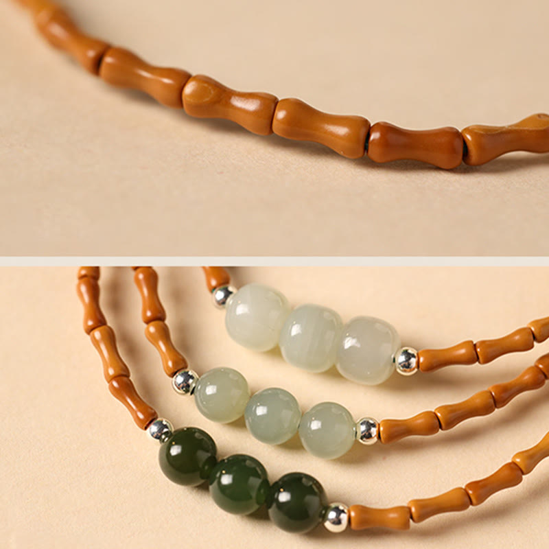 Natural Olive Pit & Hetian Jade Beaded Bracelet with Bamboo Pattern and White Copper Elements