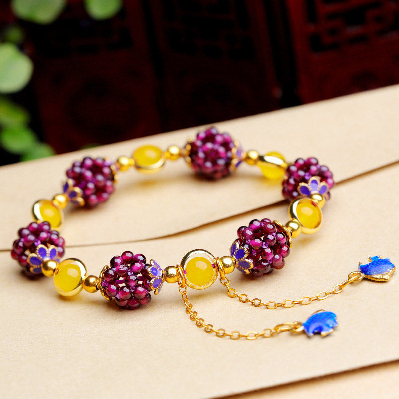 Tibetan-Inspired Handmade Garnet and Amethyst Beaded Bracelet