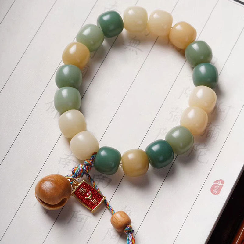 Natural Gradient Bodhi Seed Bracelet with Mokugyo Wooden Fish Charm