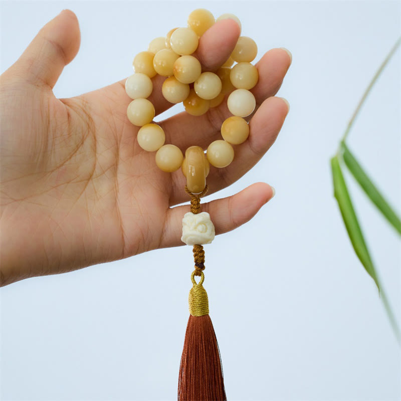Natural Bodhi Seed Ivory Fruit Dancing Lion Charm Harmony Tassel Wrist Mala