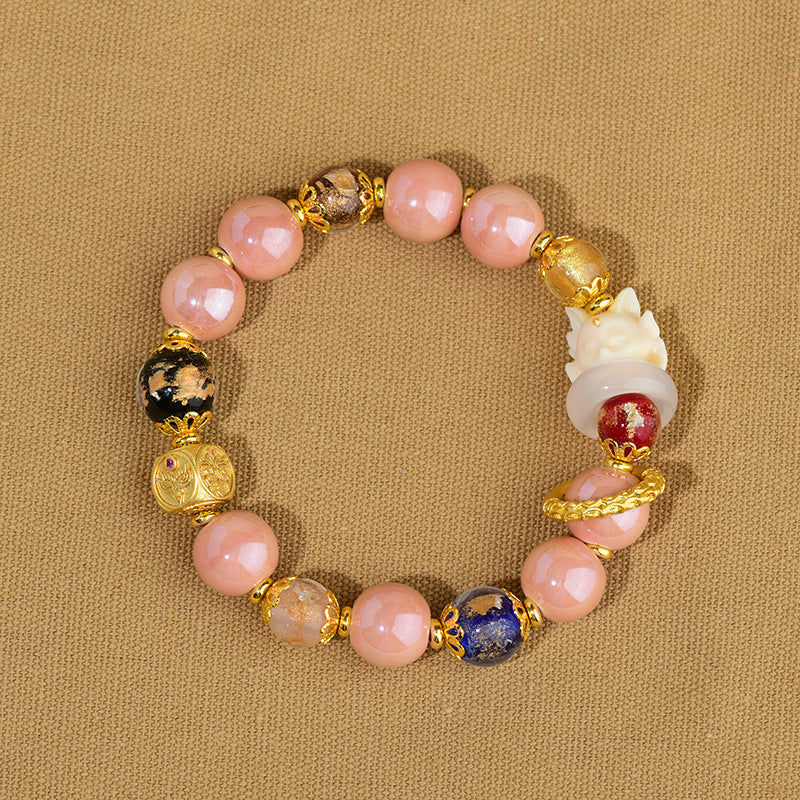 Artisanal Tibetan Incense Ash Liuli Glass Nine-Tailed Fox Charm Bracelet