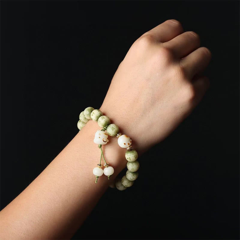 Green Bodhi Seed Om Mani Padme Hum Engraved Cat Paw Bracelet