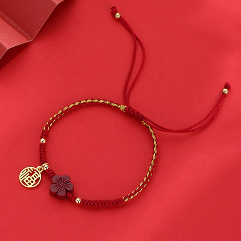Handmade Red String Cinnabar Flower and Copper Fu Character Braided Bracelet