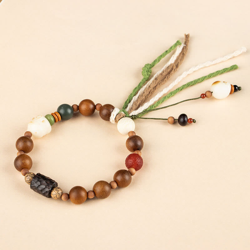 Lightning Struck Wood & Bodhi Seed Cat Paw Tassel Bracelet with Red Agate and Onyx