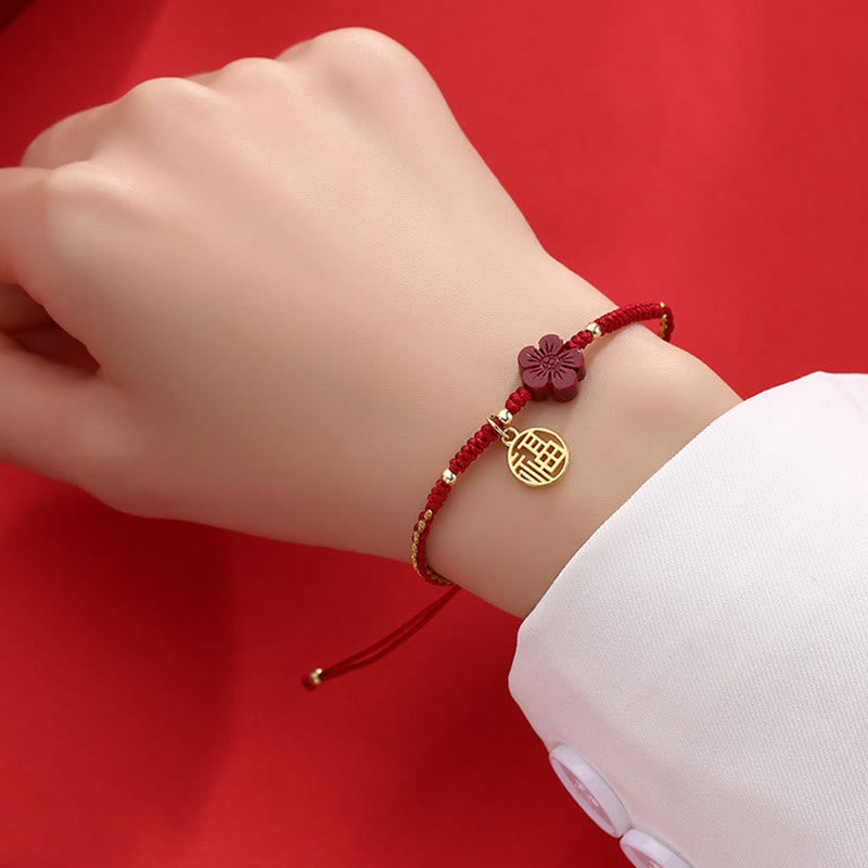 Handmade Red String Cinnabar Flower and Copper Fu Character Braided Bracelet