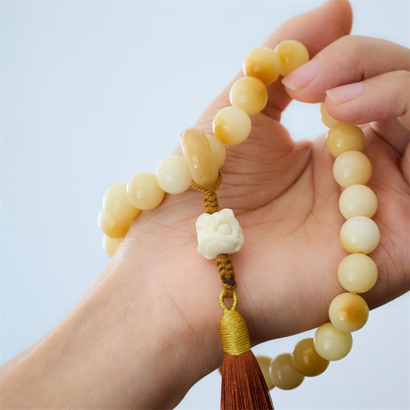 Natural Bodhi Seed Ivory Fruit Dancing Lion Charm Harmony Tassel Wrist Mala