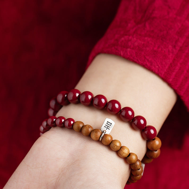 Handmade 925 Sterling Silver Peach Wood and Cinnabar Beaded Stretch Bracelet