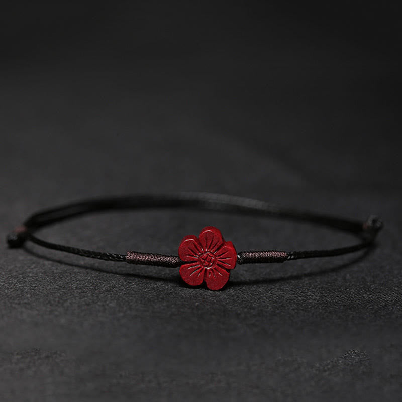 Handmade Cinnabar Braided Red String Bracelet with Carved Symbolic Charms