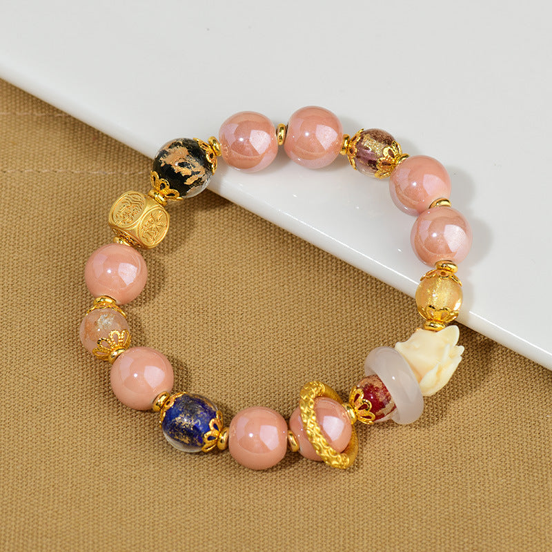 Artisanal Tibetan Incense Ash Liuli Glass Nine-Tailed Fox Charm Bracelet