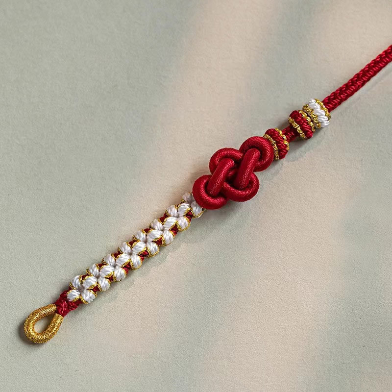 Hand-Braided Red String Bracelet with Copper Endless Knot & Peach Blossom Charm