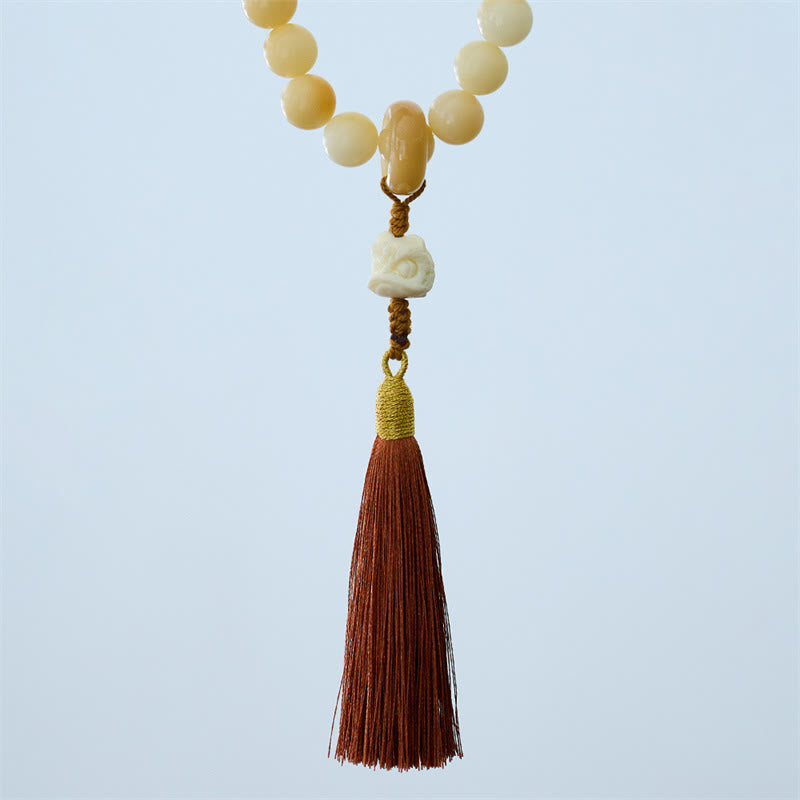 Natural Bodhi Seed Ivory Fruit Dancing Lion Charm Harmony Tassel Wrist Mala