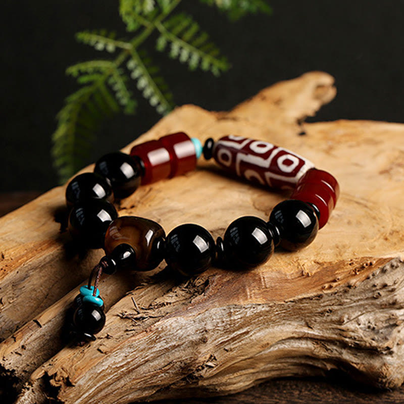 Tibetan Nine-Eye Dzi Bead and Polished Black Onyx Natural Stone Bracelet