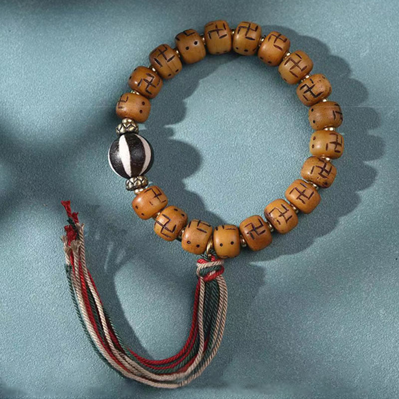 Natural Tibetan Camel Bone Bracelet with Dzi Bead, Shankha, or Kirtimukha Charms