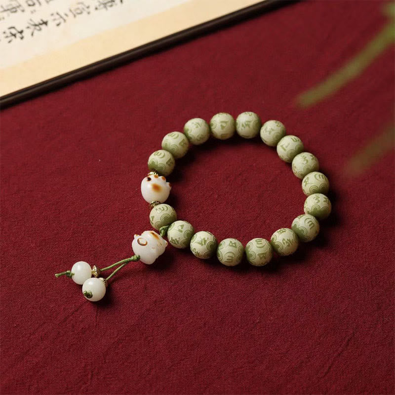 Green Bodhi Seed Om Mani Padme Hum Engraved Cat Paw Bracelet