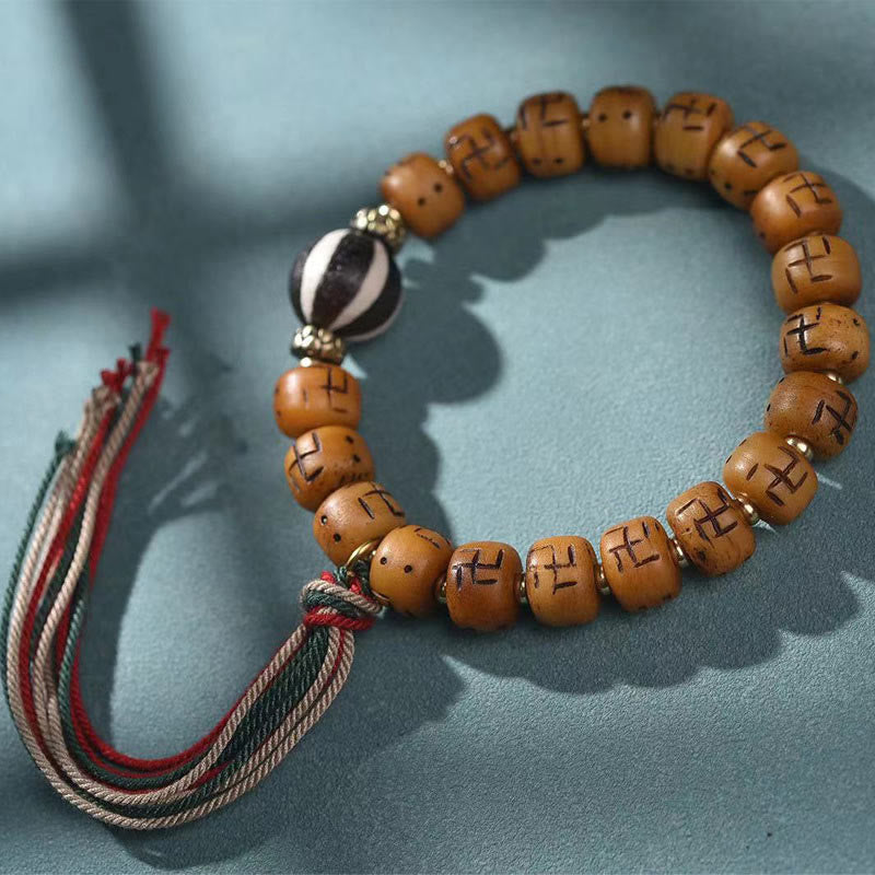 Natural Tibetan Camel Bone Bracelet with Dzi Bead, Shankha, or Kirtimukha Charms