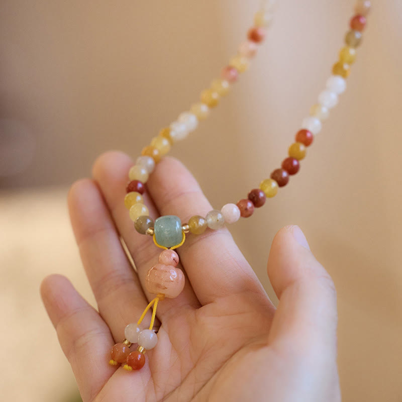 Natural Golden Silk Jade and Gold Plated Pumpkin Charm Triple Wrap Bracelet