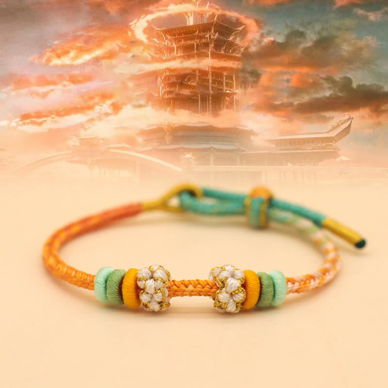 Handmade Eight-Thread Braided Endless Knot Bracelet with Peach Blossom Detail