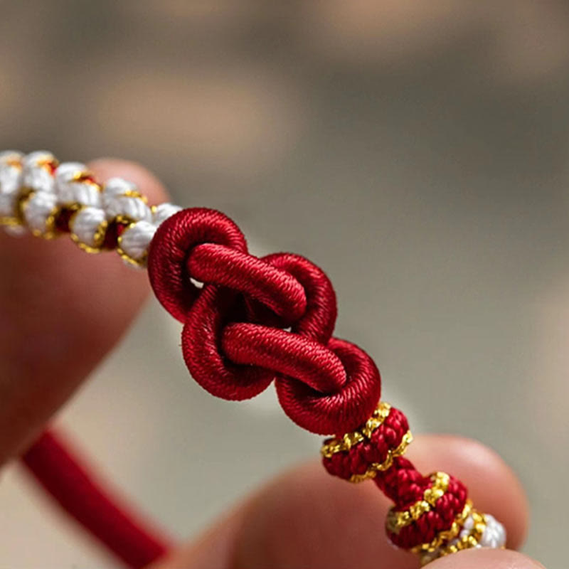 Hand-Braided Red String Bracelet with Copper Endless Knot & Peach Blossom Charm