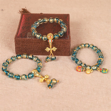 Tibetan Liuli Bead Bracelet with Gold Pixiu and Vajra Dorje Symbols