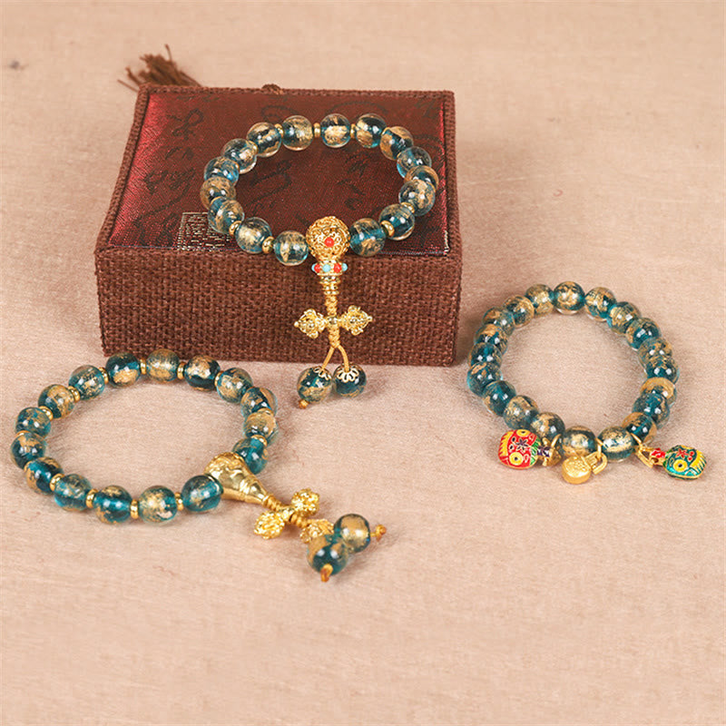 Tibetan Liuli Bead Bracelet with Gold Pixiu and Vajra Dorje Symbols