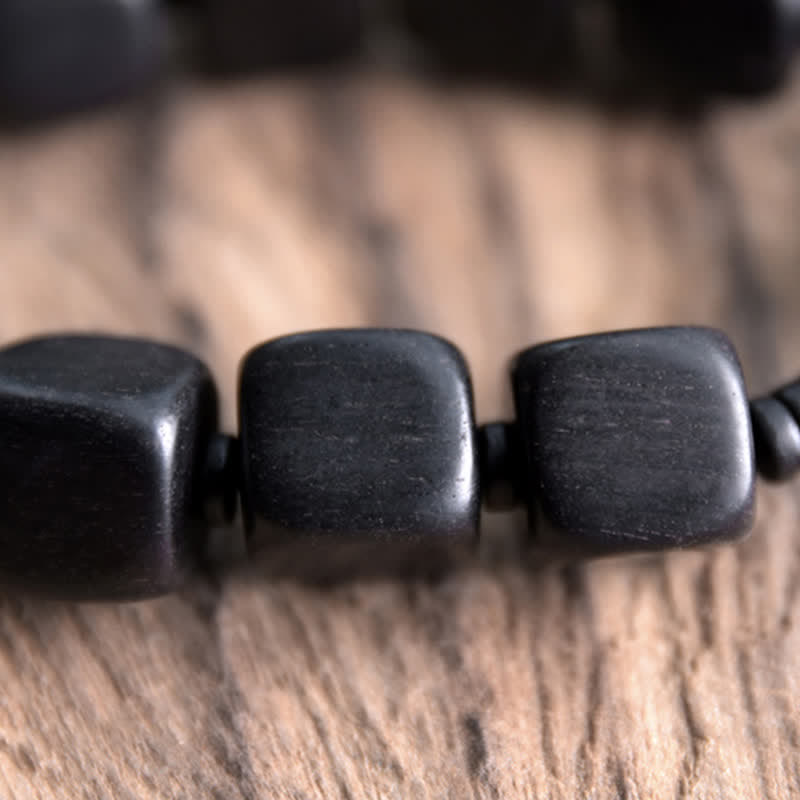 Handmade Tibetan Ebony Wood and Dzi Bead Strength Bracelet