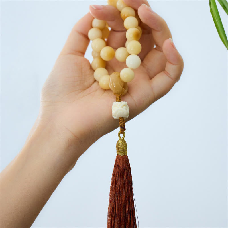 Natural Bodhi Seed Ivory Fruit Dancing Lion Charm Harmony Tassel Wrist Mala