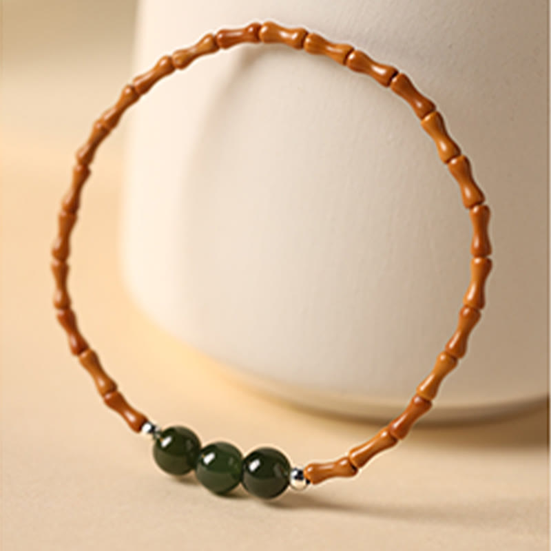 Natural Olive Pit & Hetian Jade Beaded Bracelet with Bamboo Pattern and White Copper Elements