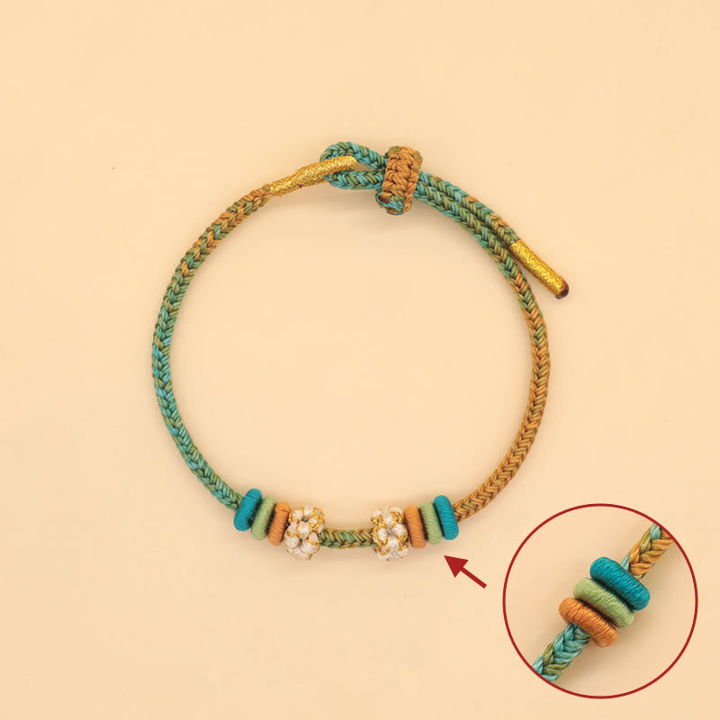 Handmade Eight-Thread Braided Endless Knot Bracelet with Peach Blossom Detail