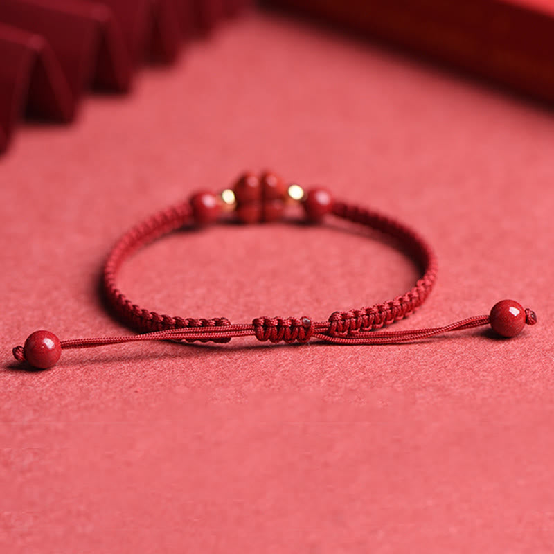 Hand-Woven Red String Cinnabar Clover and Flower Charm Bracelet