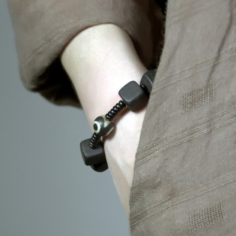 Handmade Tibetan Ebony Wood and Dzi Bead Strength Bracelet
