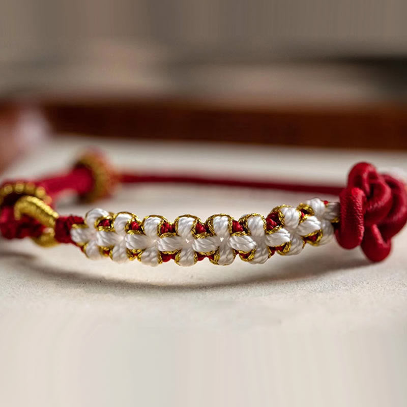 Hand-Braided Red String Bracelet with Copper Endless Knot & Peach Blossom Charm