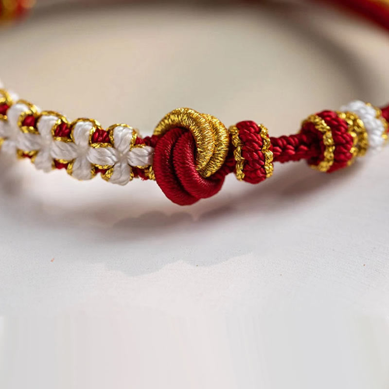 Hand-Braided Red String Bracelet with Copper Endless Knot & Peach Blossom Charm