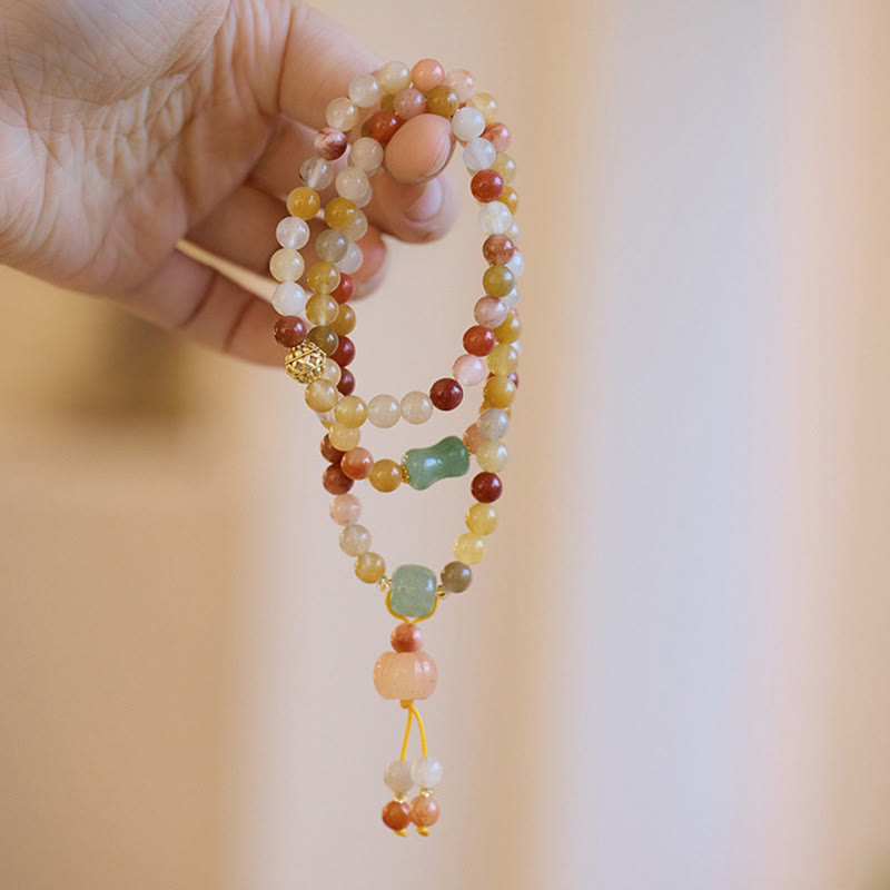 Natural Golden Silk Jade and Gold Plated Pumpkin Charm Triple Wrap Bracelet