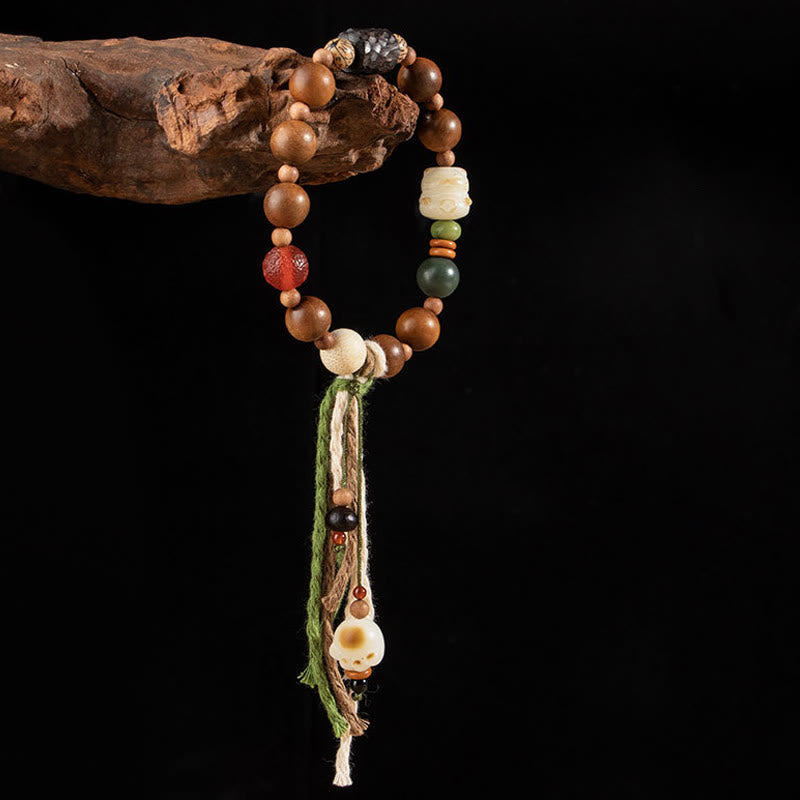 Lightning Struck Wood & Bodhi Seed Cat Paw Tassel Bracelet with Red Agate and Onyx