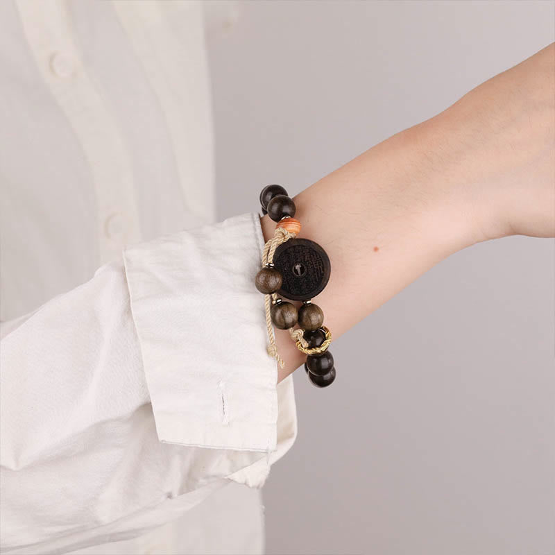 Ebony Wood Mountain Ghosts Spend Money Balance Bracelet