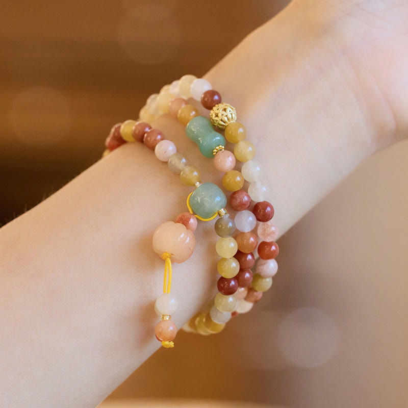 Natural Golden Silk Jade and Gold Plated Pumpkin Charm Triple Wrap Bracelet