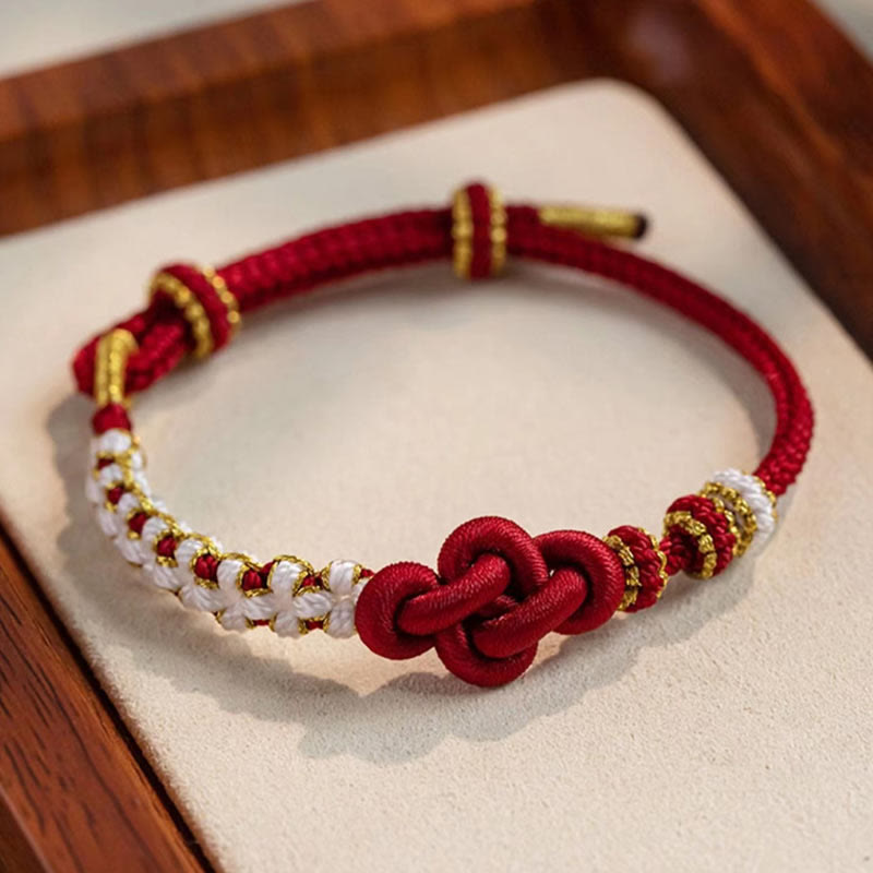 Hand-Braided Red String Bracelet with Copper Endless Knot & Peach Blossom Charm