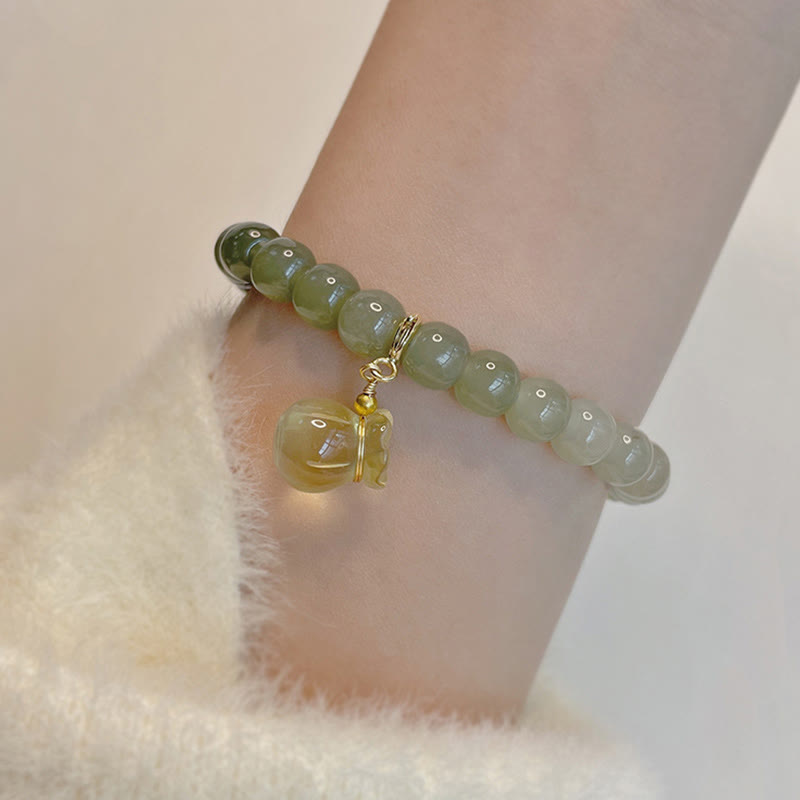 Natural Hetian Jade Beaded Bracelet with Symbolic Money Bag Charm