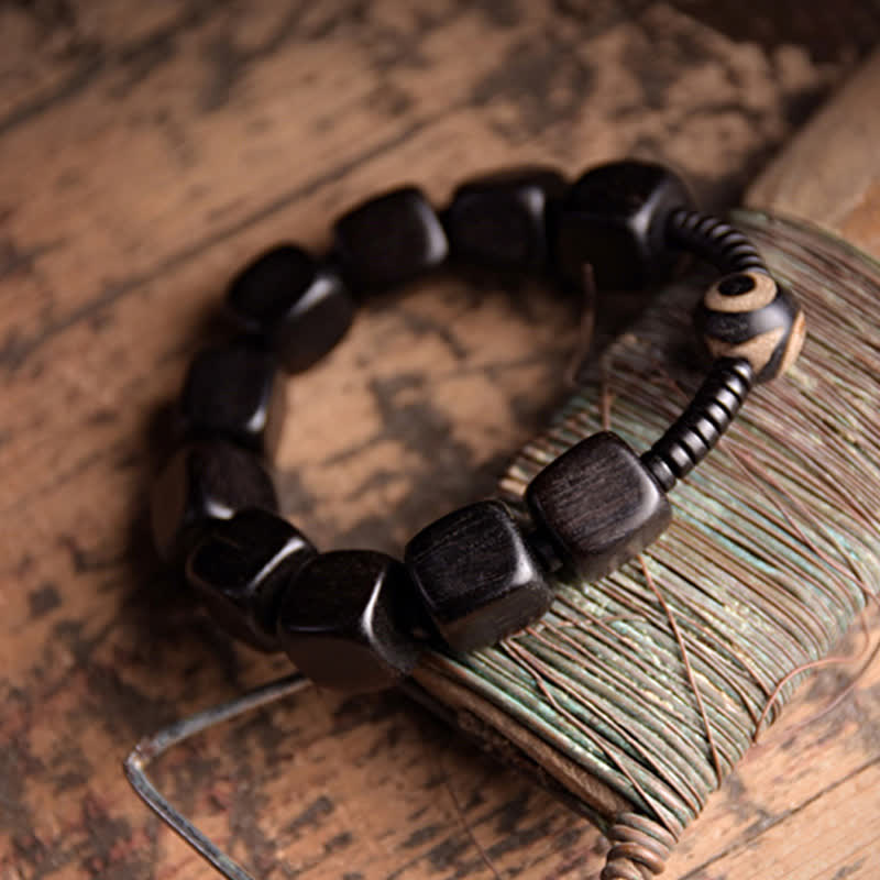 Handmade Tibetan Ebony Wood and Dzi Bead Strength Bracelet