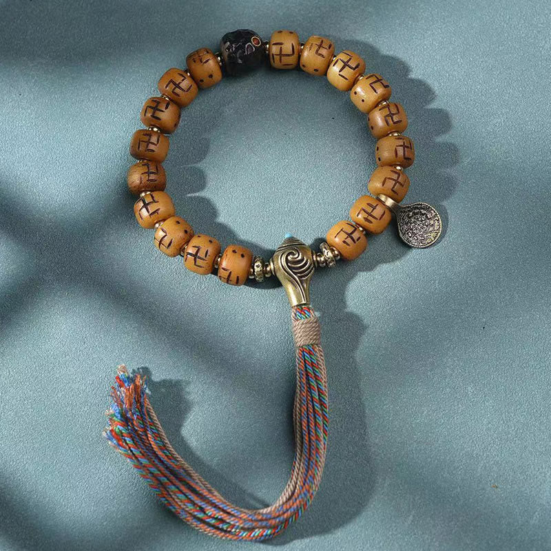 Natural Tibetan Camel Bone Bracelet with Dzi Bead, Shankha, or Kirtimukha Charms