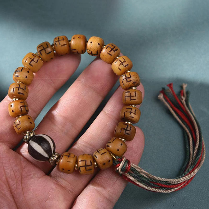 Natural Tibetan Camel Bone Bracelet with Dzi Bead, Shankha, or Kirtimukha Charms