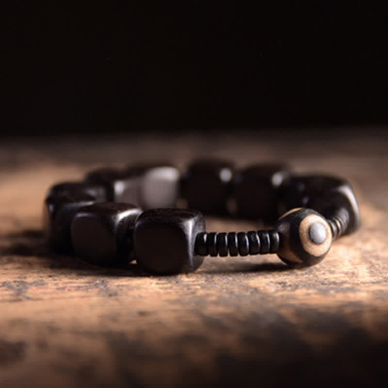 Handmade Tibetan Ebony Wood and Dzi Bead Strength Bracelet